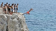 The craze for diving off the corniche is growing