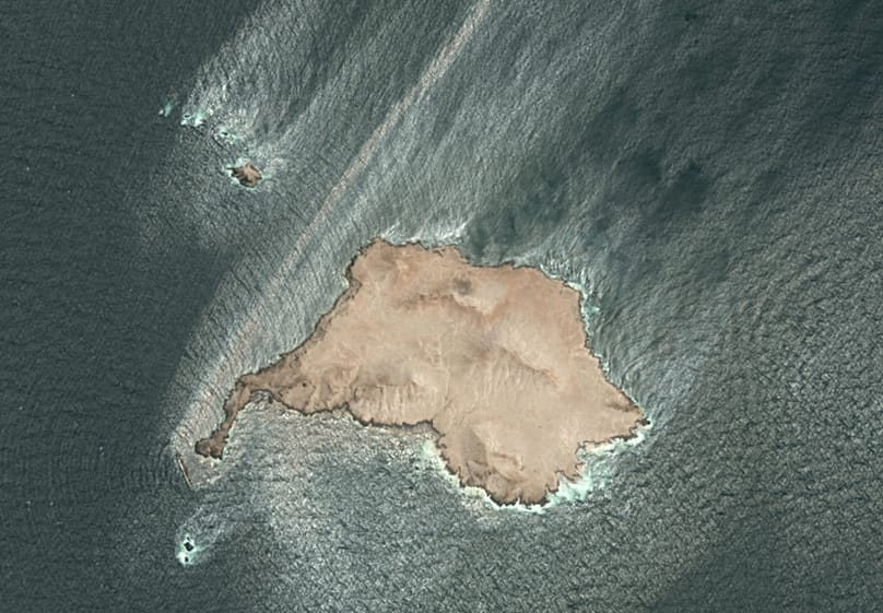This satellite photo taken Wednesday Aug. 5, 2026, shows the tanker Caroline Bezengi, grounded and partly submerged off the coast of Oman, leaking crude oil into the sea. 