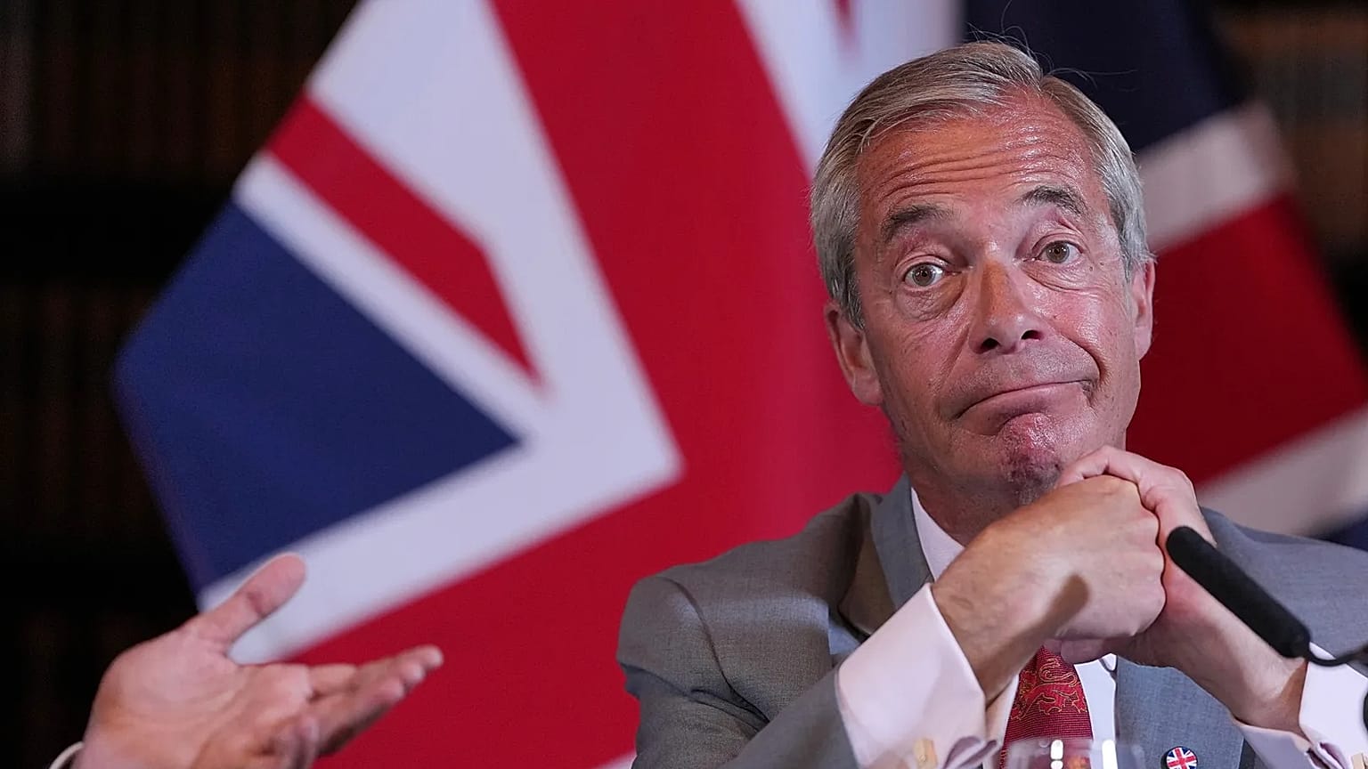 Nigel Farage, Leader of Britain's Reform UK party, attends a press conference in London, Monday, Aug. 10, 2026. (AP Photo/Kin Cheung)