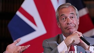 Nigel Farage, Leader of Britain's Reform UK party, attends a press conference in London, Monday, Aug. 10, 2026. (AP Photo/Kin Cheung)