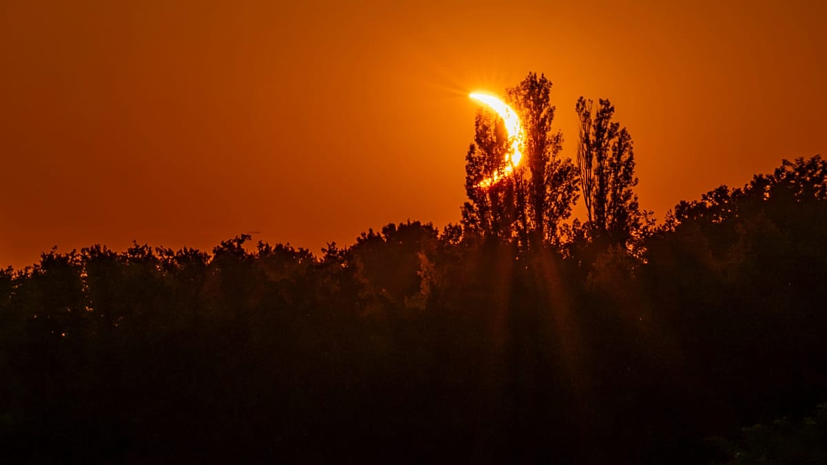 Video. Hikers in awe as solar eclipse turns sky red over French Pyrenees Video. Hikers in awe as solar eclipse turns sky red over French Pyrenees