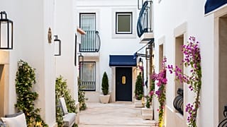 Villa Dorothéa is designed as a private micro-neighbourhood within Lapa, threaded through with passageways that give it the feel of a village. 