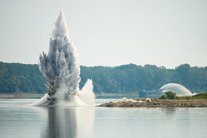 The Romanian Navy detonates underwater explosives during a controlled demolition of submerged rocks to improve water flow on the Danube River, 3 August, 2026