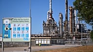 A works safety banner is placed outside a refinery and fuel terminal run by Gunvor Energy in Rotterdam, 13 August, 2026