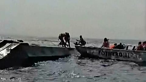 In this image taken from a video people are rescued from an overloaded ferry that capsized on Zimbabwe's Lake Kariba, 11 August, 2026
