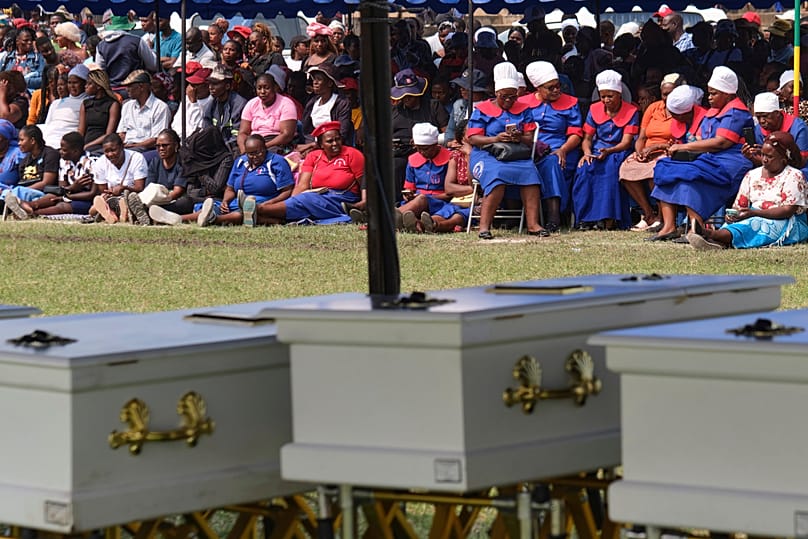 Mourners gather for a memorial service for the victims of a ferry capsized on lake Kariba in Kariba, 13 August, 2026