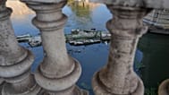 The ruins of the ancient Roman Neronian bridge, emerge from the riverbed of the Tiber river due to drought, in Rome, Thursday, Aug. 13, 2026. 