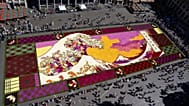 A giant flower carpet inspired by The Great Wave off Kanagawa by Japanese artist Katsushika Hokusai at the historic Grand Place in Brussels, Thursday, Aug. 13, 2026.