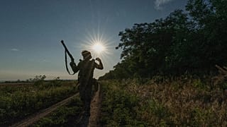 FILE: Ukrainian serviceman walks at his position near the frontline city of Kramatorsk, Donetsk region, Ukraine, July 14, 2026