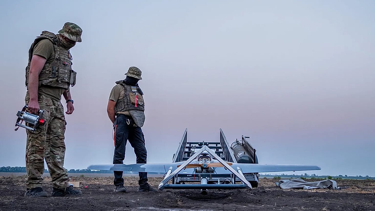 Ukrainian servicemen prepare a "Chaklun" strike drone used for deep-strike operations against Russian positions in Crimea, in an undisclosed location in Ukraine.