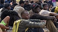 Inmigrantes esperando en la frontera de Ceuta, 15 de agosto de 2026