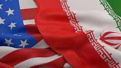 العلمان الأمريكي والإيراني