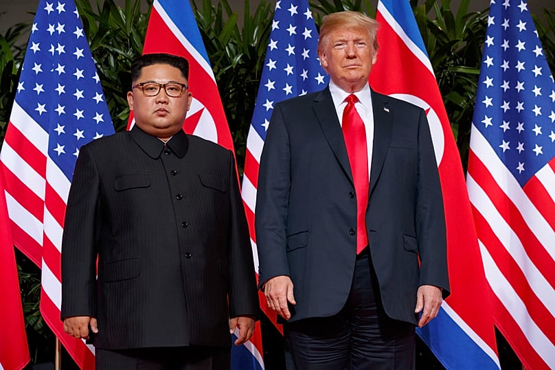 FILE - US President Donald Trump meets with North Korean leader Kim Jong Un on Sentosa Island, in Singapore, June 12, 2018