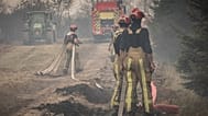 Firefighter work to extinguish wildfires at Hautes Fagnes near Waimes, Belgium, Sunday, Aug. 16, 2026