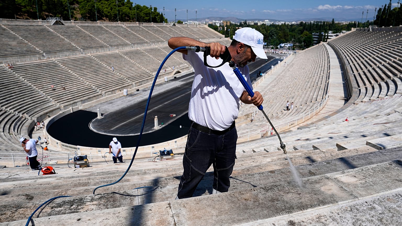 Cleaning crews at the Panathenaic Stadium