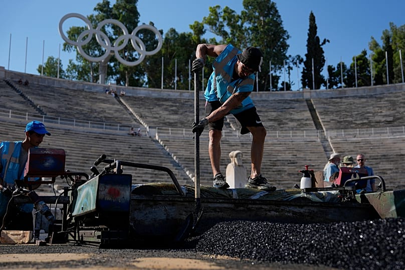 Cleaning crews at the Panathenaic Stadium