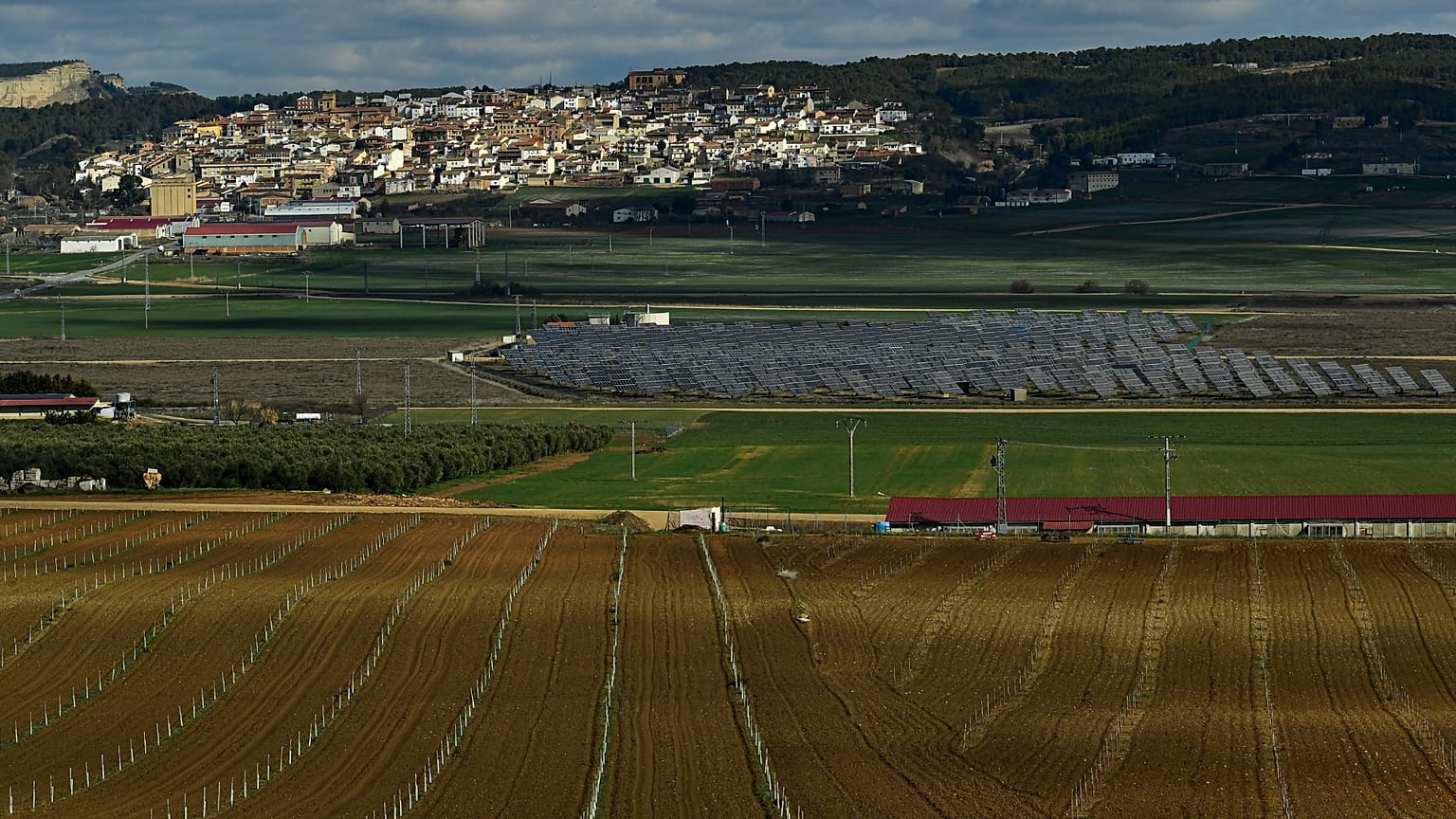Solar panels work in the small town of Sesma, Navarra Province, northern Spain, Friday, Feb. 24, 2023.