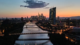 File - The European Central Bank, right, is seen in Frankfurt, Germany, Tuesday, 21 July 2026. 