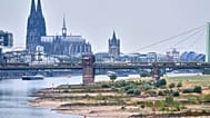 The river Rhine has less boat traffic due to low water levels during a heat wave and a prolonged drought, by Cologne Cathedral in Cologne, Germany, Aug. 3, 2026. 