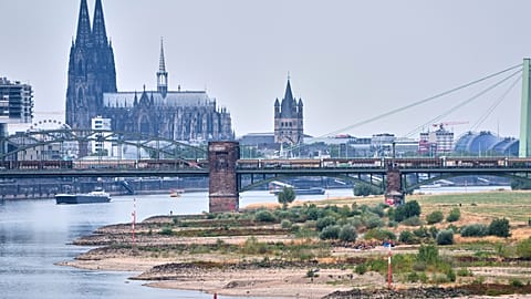 The river Rhine has less boat traffic due to low water levels during a heat wave and a prolonged drought, by Cologne Cathedral in Cologne, Germany, Aug. 3, 2026. 