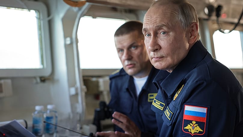 Russian President Vladimir Putin watches a military exercise on board the Varyag missile cruiser of the Pacific Fleet near Sakhalin Island, Russia, 12 August, 2026.