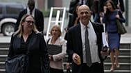 Attorney Paul W. Schmidt, representing Meta, right, arrives at a Federal Courthouse Wednesday, Aug. 12, 2026, in Oakland, California, US. 