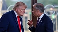 US President Donald Trump speaks with Canadian Prime Minister Mark Carney at a working lunch with leaders of G7 and the Middle East in Evian-les-Bains, France, 16 June 2026