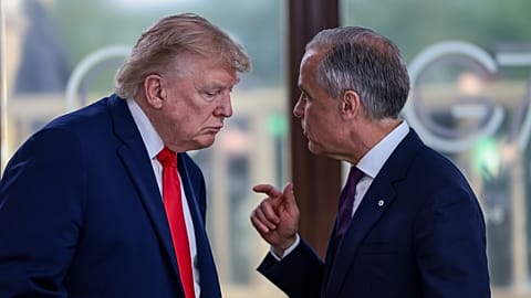 US President Donald Trump speaks with Canadian Prime Minister Mark Carney at a working lunch with leaders of G7 and the Middle East in Evian-les-Bains, France, 16 June 2026