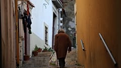 An elderly woman in the Mouraria district of Lisbon, 20 December 2013.