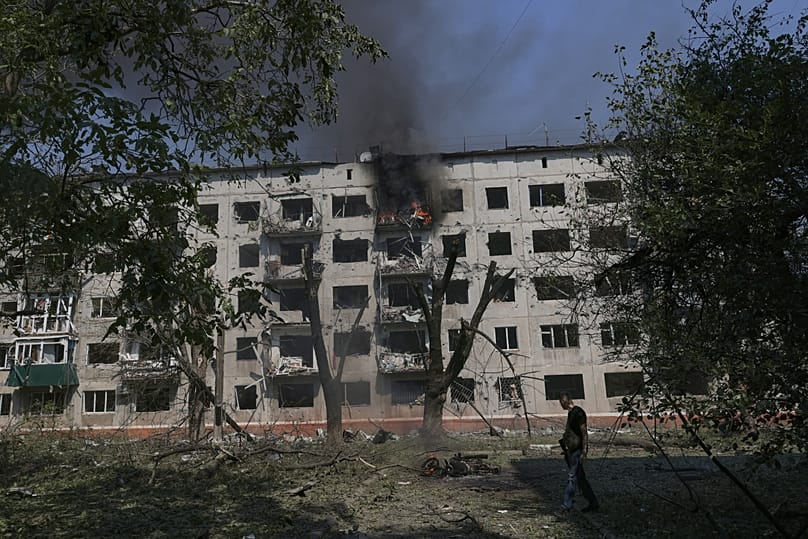 Smoke raises from the damaged apartment building following Russian air attack in Kramatorsk, 18 August, 2026
