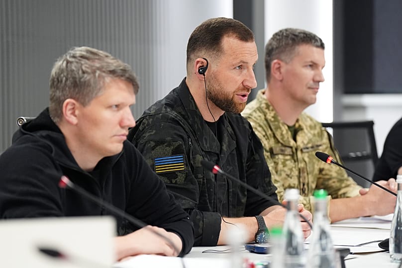 Acting Minister of Defence of Ukraine Yevhen Khmara, center, during a meeting with Britain's Defense Secretary Wes Streeting in Kyiv, Wednesday, Aug. 5, 2026.