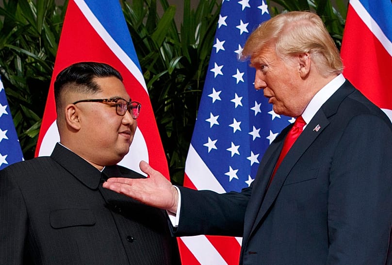 FILE - US President Donald Trump meets with North Korean leader Kim Jong Un on Sentosa Island in Singapore, on June 12, 2018