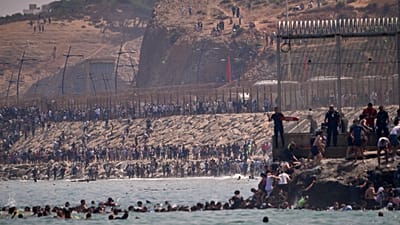 Migrants cross from Morocco into the Spanish enclave of Ceuta, 30 July, 2026