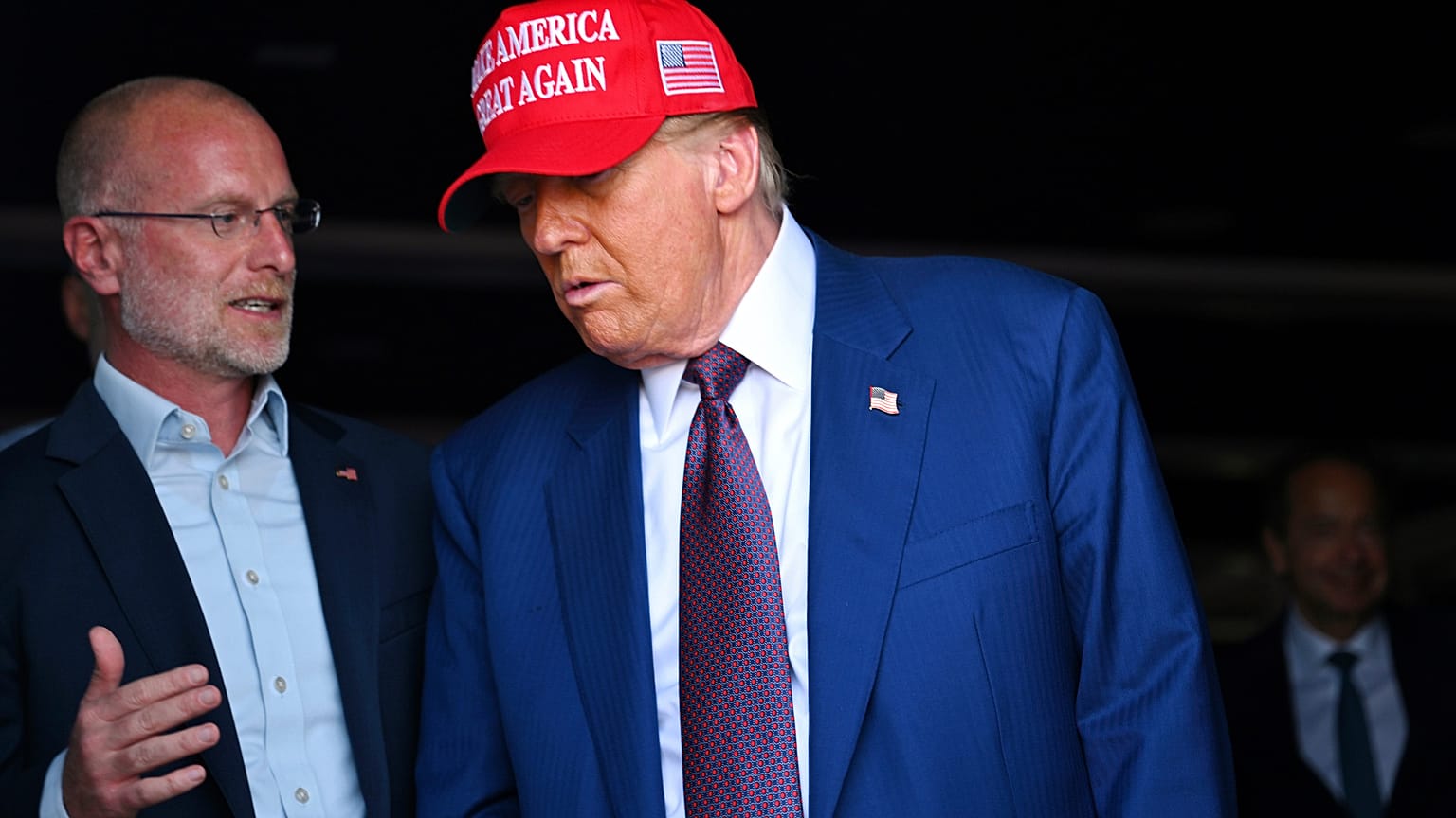 FCC Chairman Brendan Carr talks to Donald Trump