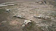 FILE - Decommissioned Syrian air force planes are seen at the Abu Duhur military air base east of Idlib, following the takeover of the area by Syrian opposition fighters on Sa