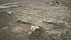 FILE - Decommissioned Syrian air force planes are seen at the Abu Duhur military air base east of Idlib, following the takeover of the area by Syrian opposition fighters on Sa