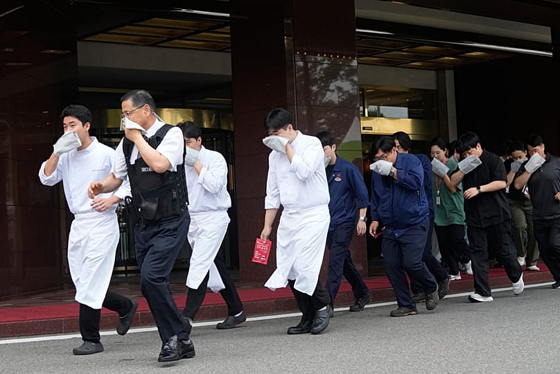 Staff members of a hotel take part in an anti-terror drill as part of a military exercise between the US and South Korea in Seoul, South Korea, Wednesday, Aug. 19, 2026