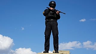 A member of police special forces stands guard in Iran