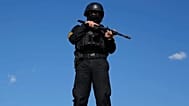 A member of the police special forces stands guard in Iran