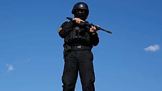 A member of the police special forces stands guard in Iran
