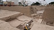 An archaeologist excavates skeletal remains at the Huaca Pucllana archaeological site in Lima, Peru, Tuesday, Aug. 18, 2026.