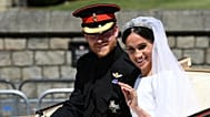 Prince Harry and Meghan wave from their carriage after their wedding at Windsor Castle on 19 May 2018. (Paul Ellis/Pool Photo via AP)
