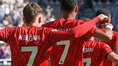 FILE - Liverpool's players wear football shirts featuring number 7 Kevin Keegan before the English Premier League soccer match with Newcastle Aug. 23, 2026.