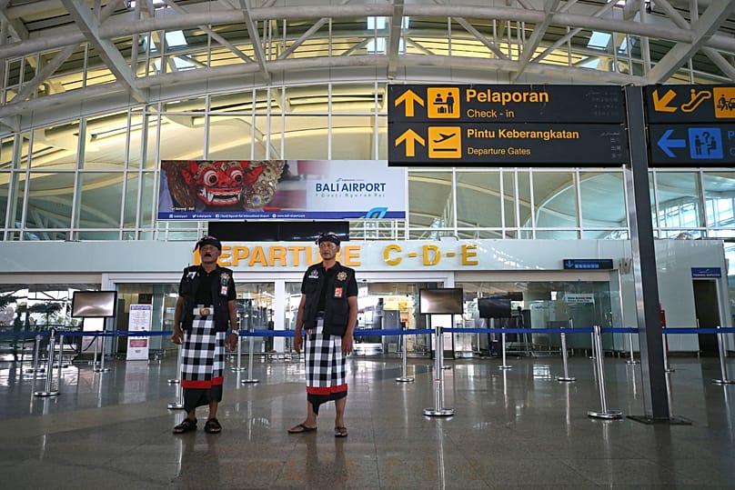 Balinese traditional guards called "pecalang" patrol the airport on the Day of Silence in Bali, 11 March, 2024