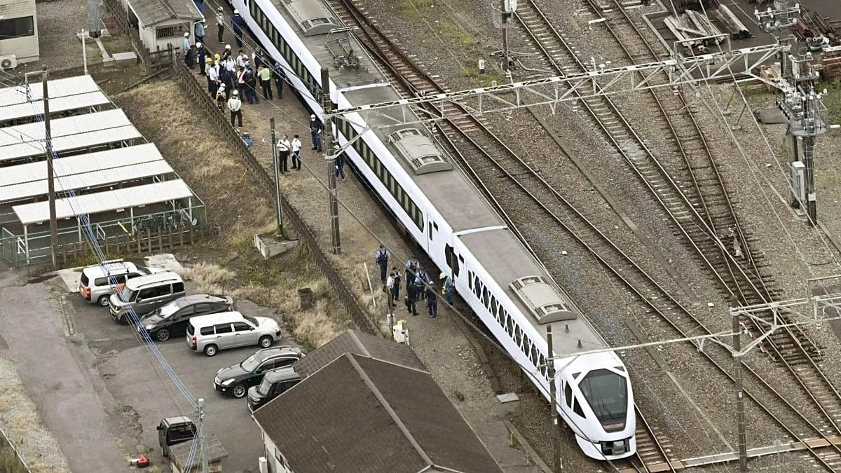 Tokyo-bound express train hits and kills four workers at railway station in Japan