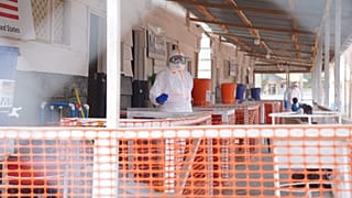 Health workers are seen at the Ebola treatment centre in Bunia General Hospital, 11 August, 2026