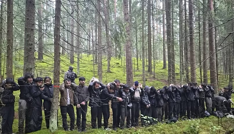 The 28 migrants were stopped after crossing through an underground passage into Latvia. 