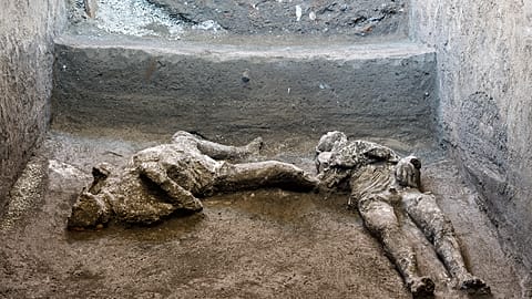 The casts of what are believed to have been a wealthy man and his slave, fleeing the volcanic eruption of Vesuvius almost 2,000 years ago in Pompeii