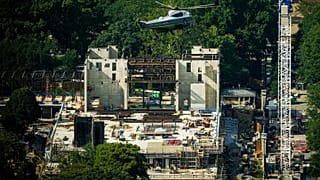  Marine One with President Donald Trump passes over construction on the new White House ballroom, Friday, Aug. 21, 2026,