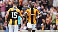 Hull City's Nobel Mendy, right, celebrates scoring during the English Premier League soccer match between Hull City and Manchester United i